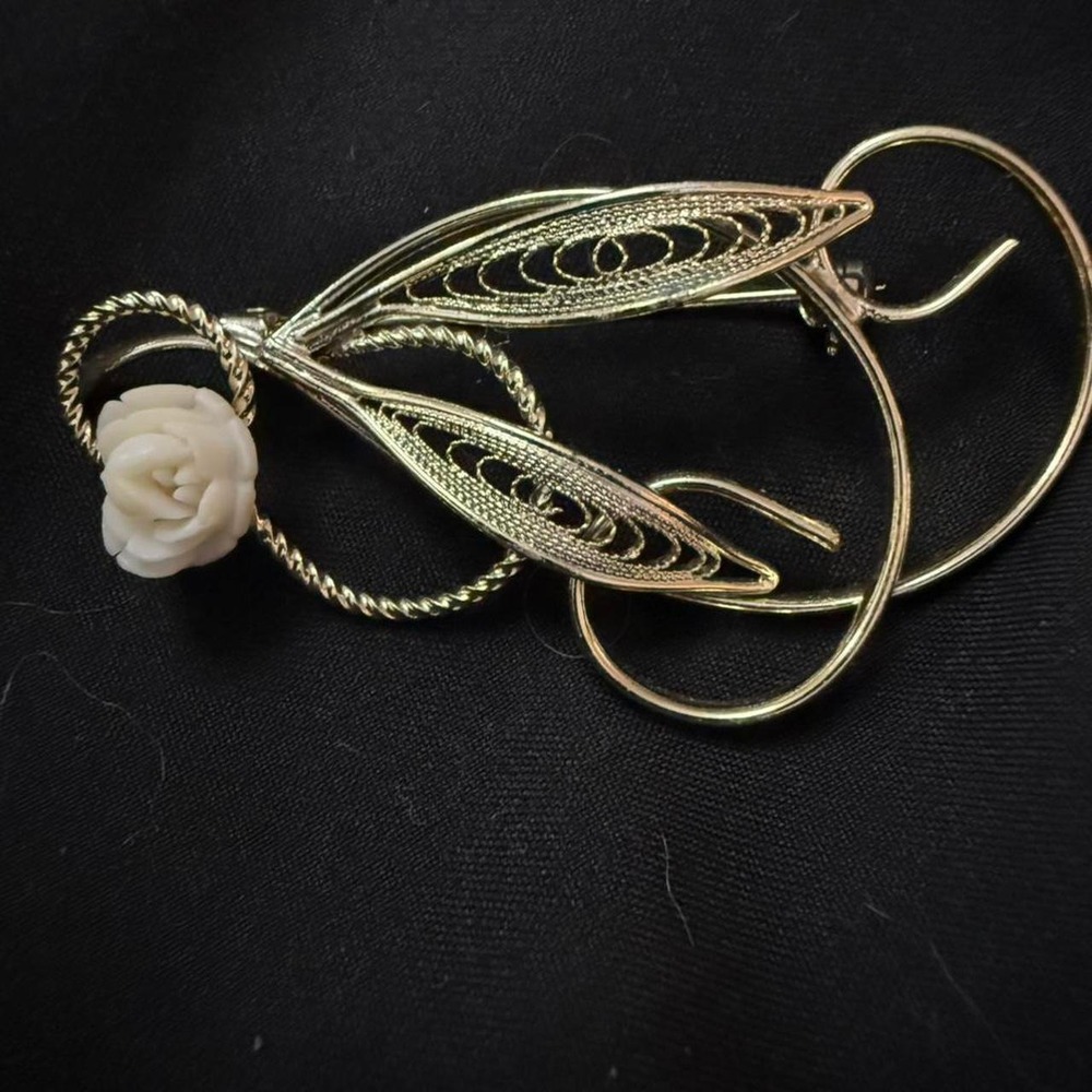 Gold tone fairy wing and flower brooch